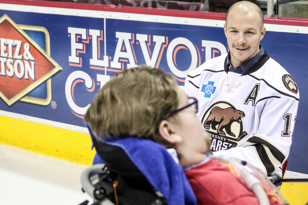 Zach Sill Greets A Fan Before Taking A Photo