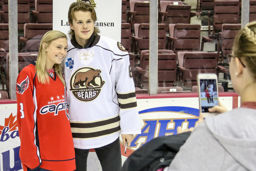 Defenseman Lucas Johansen Take A Photo With A Caps Fan