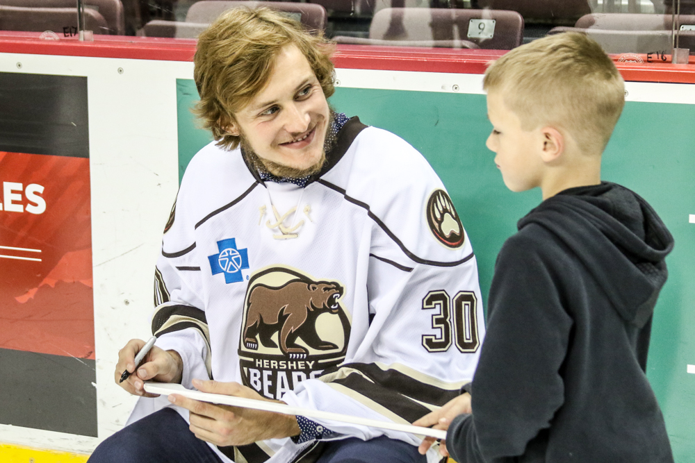 Vitek Vanecek Smiles After Being Presented With A Goalie Stick To Sign