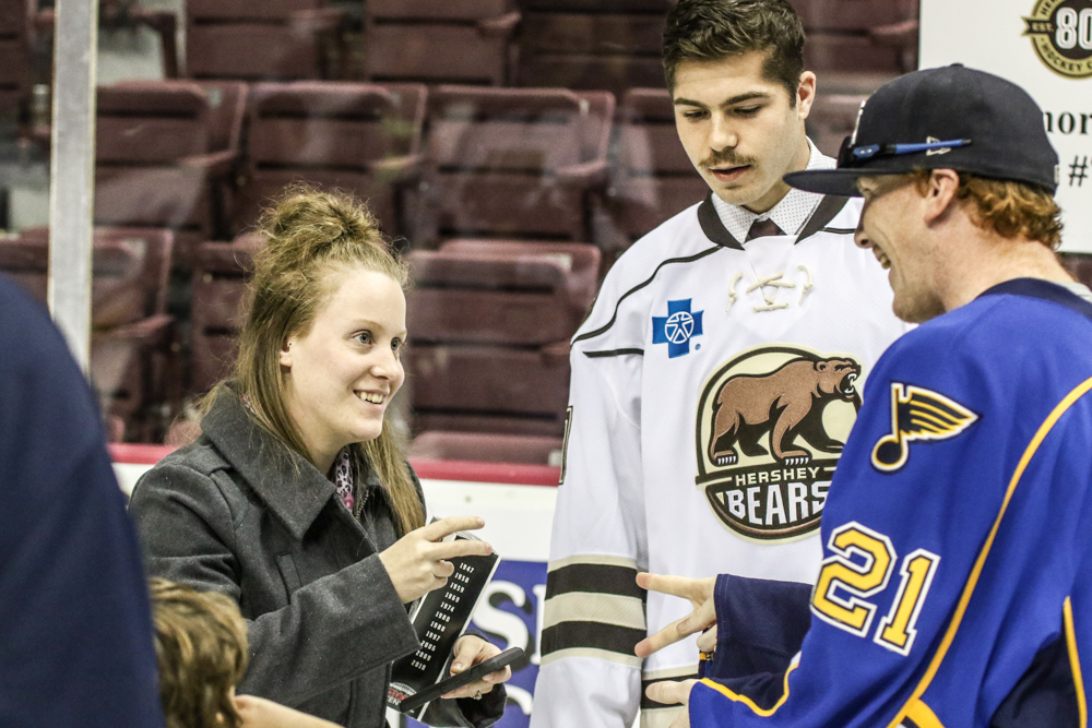 Two Fans Play Rock Paper Scissors For Connor Hobbs' Sign.