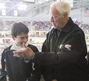 HERSHEY, PA - Gordie Howe has fun with a Bears fan during intermission of the Hershey Bears - Syracuse Crunch game Wednesday night (Kyle Mace / Sweetest Hockey on Earth)