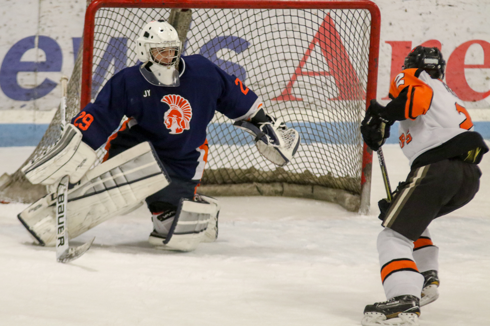 Chris Larkin Goes To Make A Save Against A Palmyra Player.